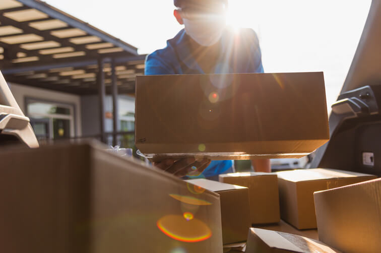 Loading a van with boxes