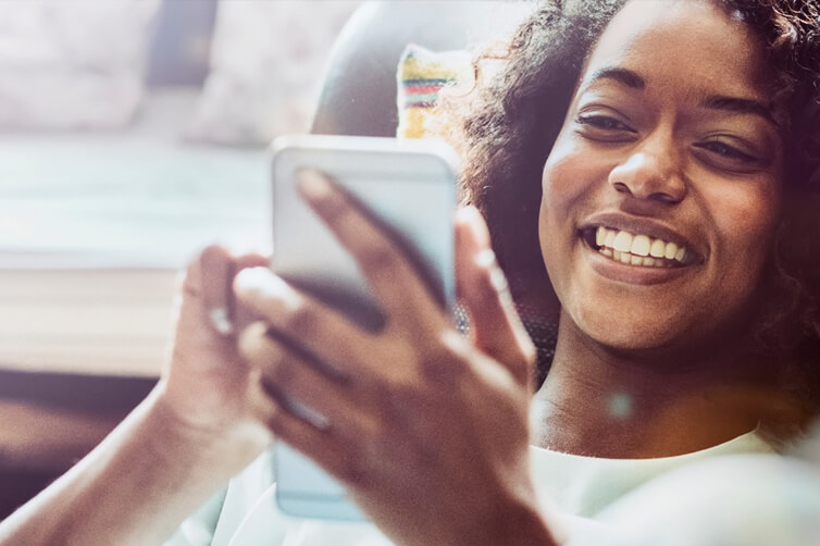 Woman using mobile device