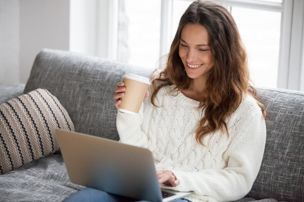 Woman post purchase experience on laptop