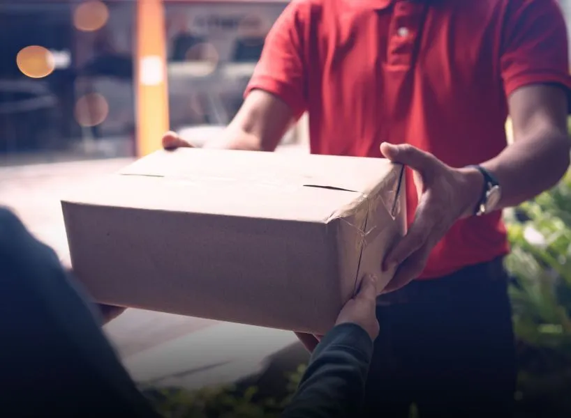 Carrier delivering a package